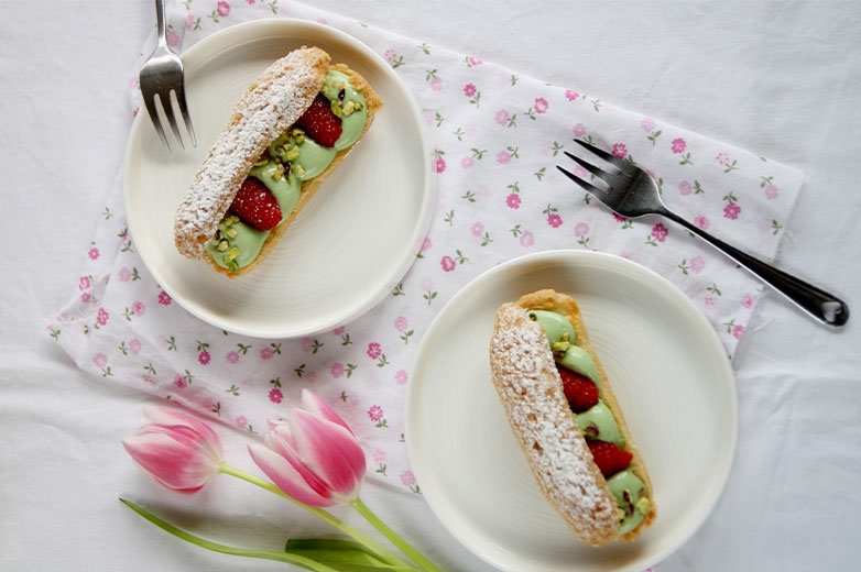 Éclairs with Pistachio Cream and Raspberries