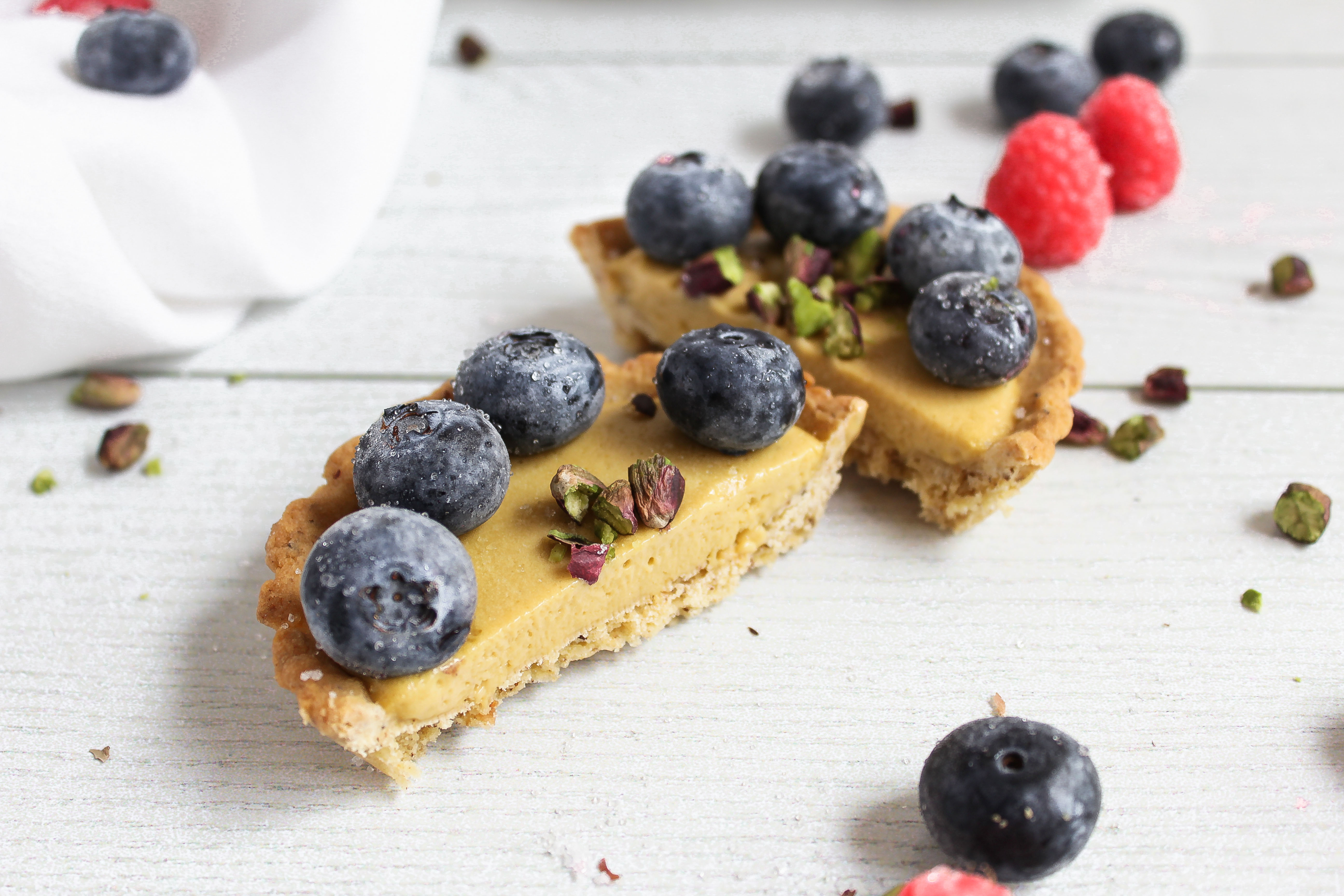 tartelette pistacchio e frutti di bosco